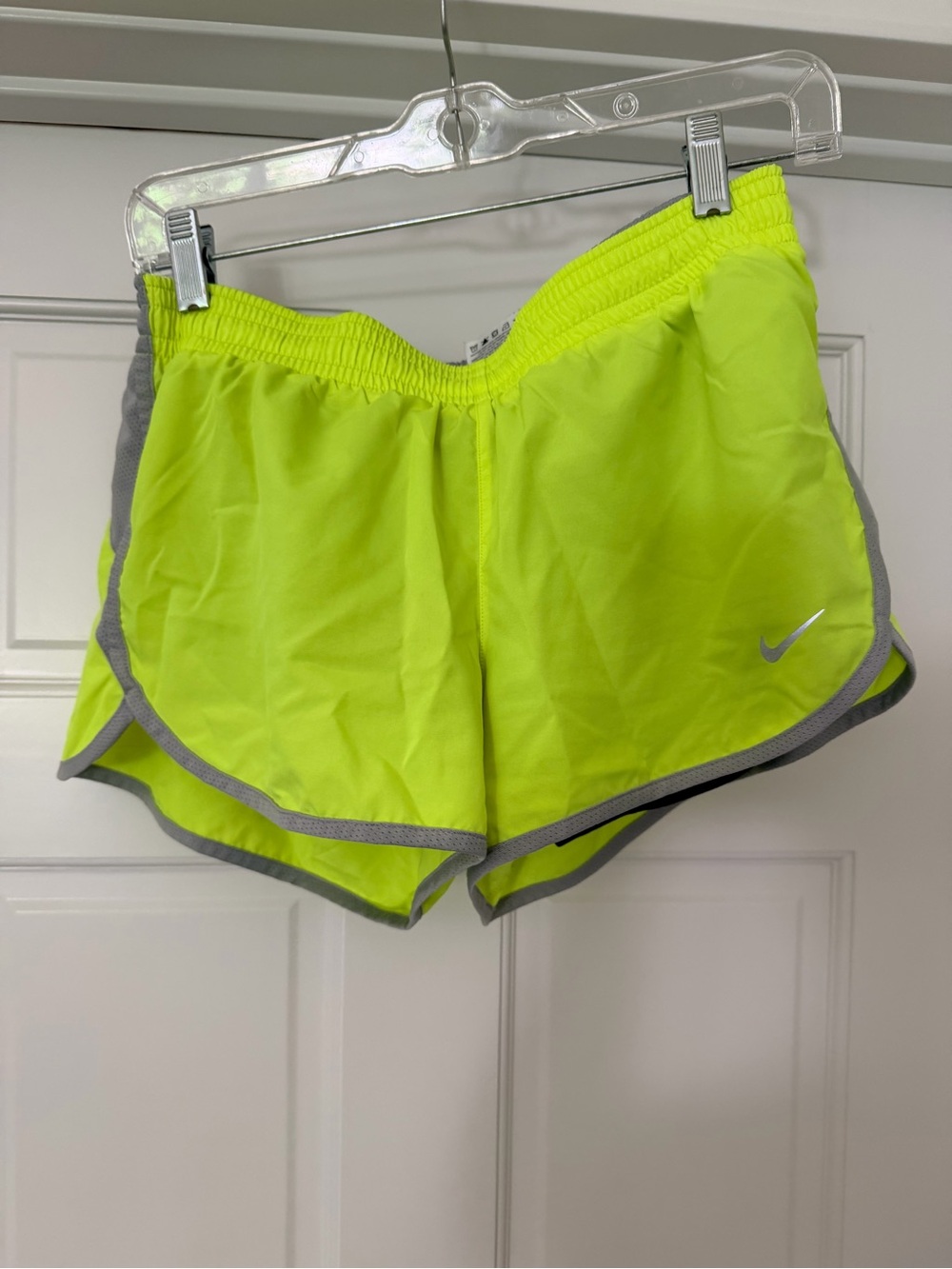 Nike Women’s Neon Yellow Athletic Running Shorts with Built in shorts. Size med